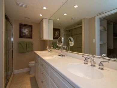 Bathroom with dual vanity & walk-in shower